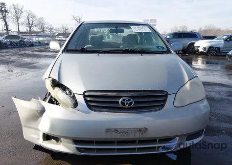 2004 Toyota Corolla Le z USA, uszkodzony, nr VIN 2T1BR32E04C205841